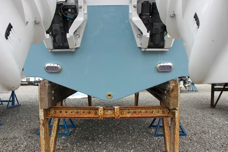 Slide: The Image of Yamaha outboard motors on a 2026 Sea Hunt Ultra 265 SE boat, parked on gravel. - 8