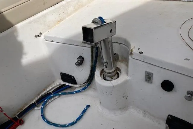 Slide: The Image of Interior of a 1979 Chrysler 26 boat showing a metal mount and ropes. - 12