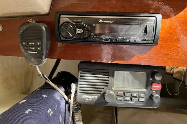 Slide: The Image of 1979 Chrysler 26 interior with Pioneer stereo and Lowrance marine radio equipment. - 30