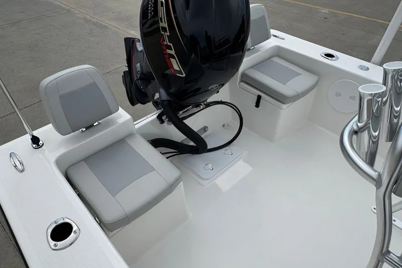 Slide: The Image of Bay Rider 2060 boat interior with seating and motor, 2025 model. - 13