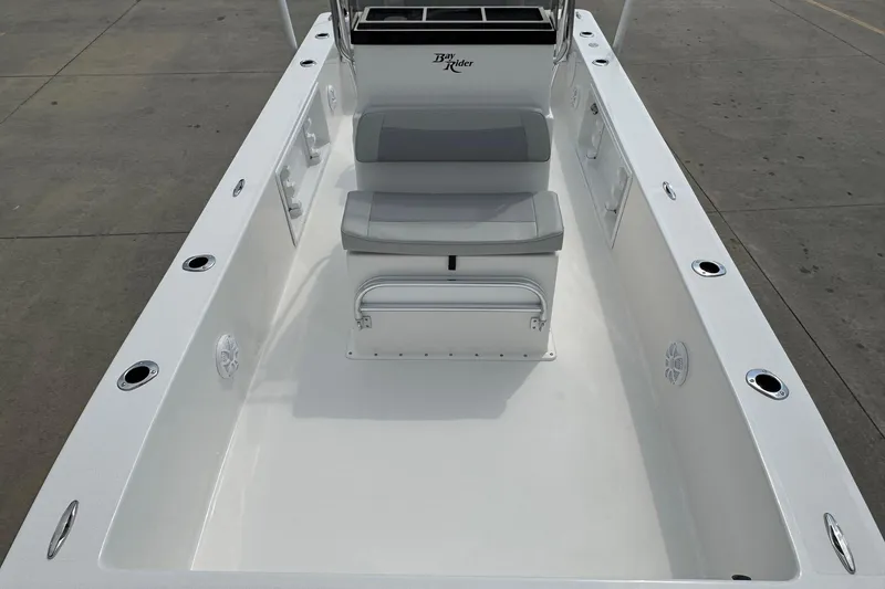 Slide: The Image of Bay Rider 2060 boat interior, 2025 model, featuring seating and storage compartments. - 20