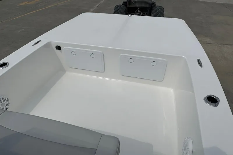 Slide: The Image of Bay Rider 2060 boat deck, 2025 model, featuring storage compartments and rod holders. - 6