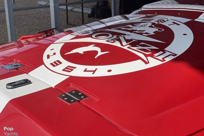 Slide: The Image of Red 2017 Donzi 22 Classic boat with logo and dolphin emblem. - 16