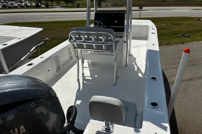 Slide: The Image of 2026 Bay Rider 2260 boat interior with seating and steering console. - 14