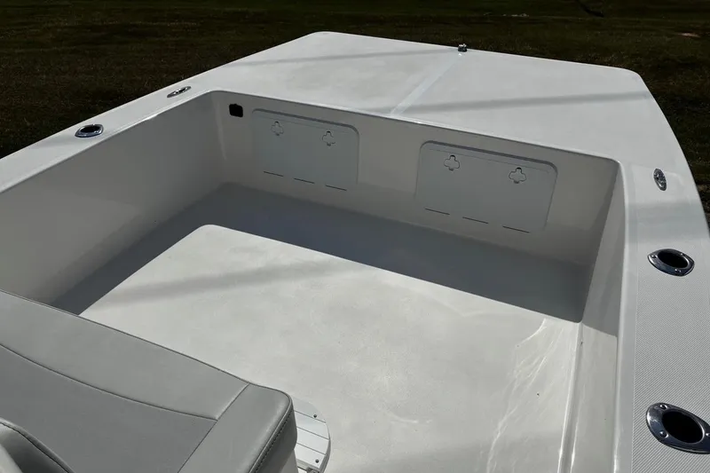 Slide: The Image of 2026 Bay Rider 2260 boat interior with spacious seating and storage compartments. - 18