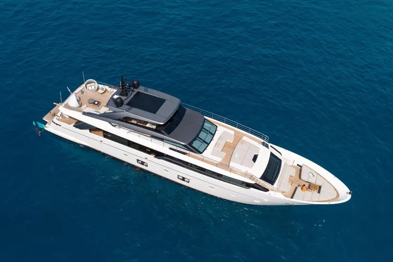 Slide: The Image of Luxurious 2022 Sanlorenzo SL 120A yacht cruising on clear blue waters. - 3