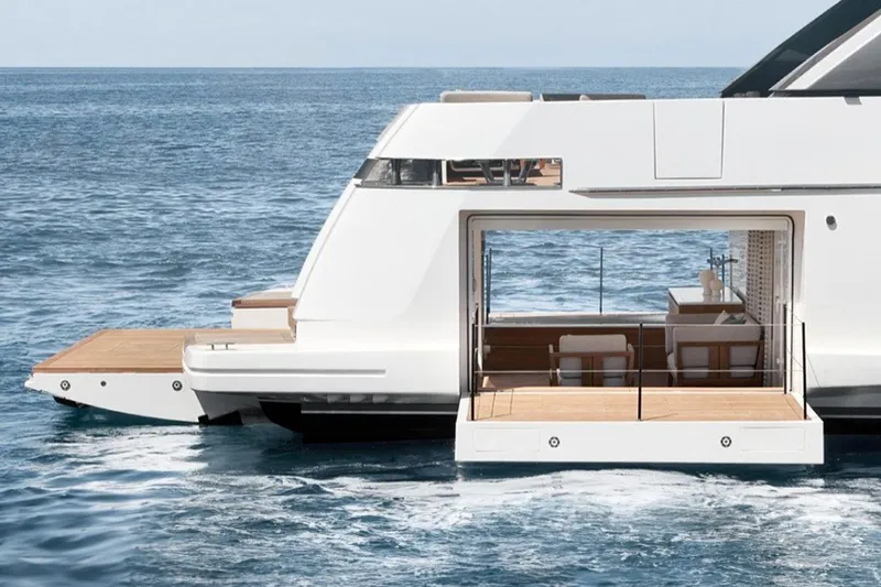 Slide: The Image of Sanlorenzo SL 120A 2022 yacht with open deck, luxurious interior, and ocean backdrop. - 5