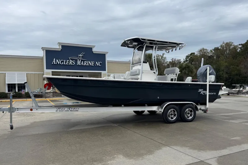 Slide: The Image of 2026 Bay Rider 2260 FS boat on trailer at Anglers Marine NC dealership. - 1