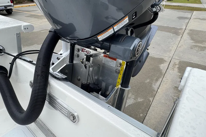 Slide: The Image of Bay Rider 2260 FS 2026 boat engine detail with hydraulic lift system. - 14