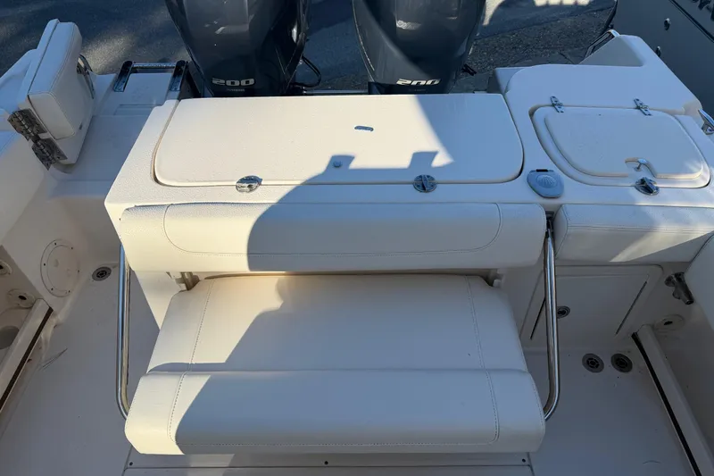 Slide: The Image of 2022 Grady-White Fisherman 257 boat interior with seating and dual Yamaha 200 engines. - 12