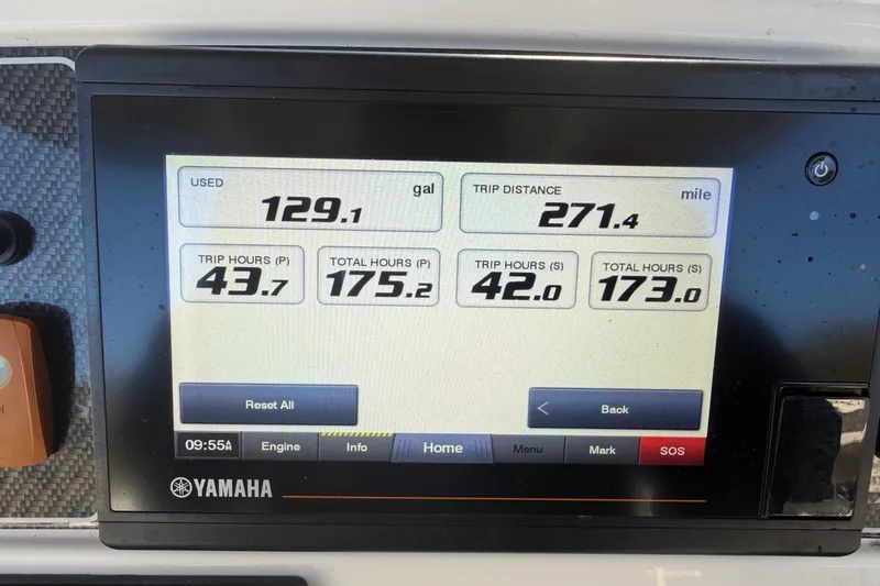 Slide: The Image of Yamaha display on 2022 Grady-White Fisherman 257 showing fuel and trip data. - 15