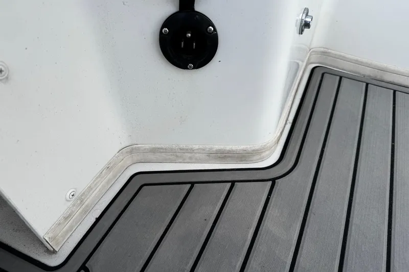 Slide: The Image of Close-up of 2021 Parker 2320 Sport Cabin deck with sleek, modern design. - 11