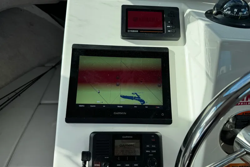 Slide: The Image of Garmin navigation system on 2021 Parker 2320 Sport Cabin boat dashboard. - 17