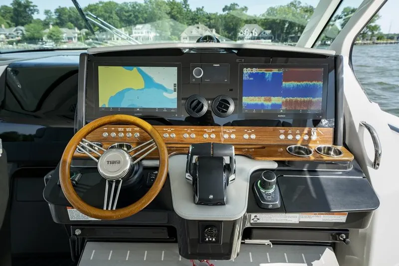 Slide: The Image of Manufacturer Provided Image: 2025 Tiara Yachts 43 LS helm with advanced navigation displays and controls. - 14