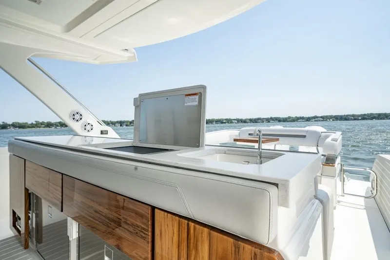 Slide: The Image of Manufacturer Provided Image: 2025 Tiara Yachts 43 LS luxury yacht deck with modern amenities and sleek design. - 20