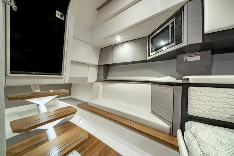 Slide: The Image of Manufacturer Provided Image: Interior of 2025 Tiara Yachts 43 LS, featuring modern design and wooden accents. - 24