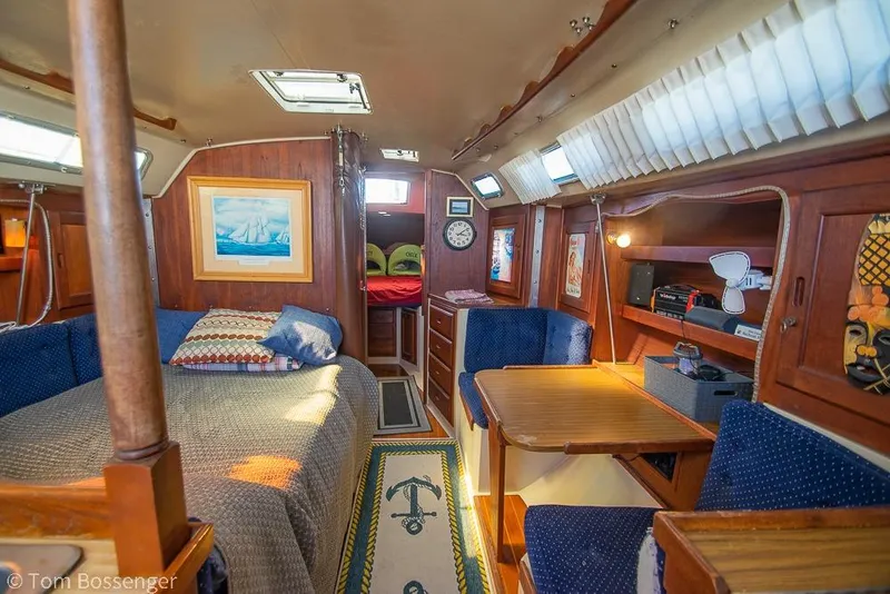 Slide: The Image of Interior of a 1984 Catalina 36 sailboat with cozy seating and nautical decor. - 10