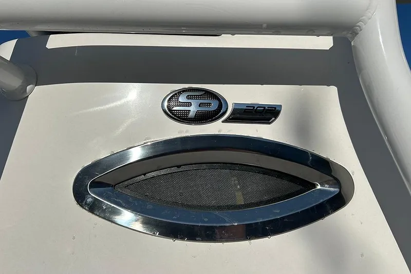 Slide: The Image of 2026 Sea Pro 202 Center Console boat emblem and vent detail. - 16