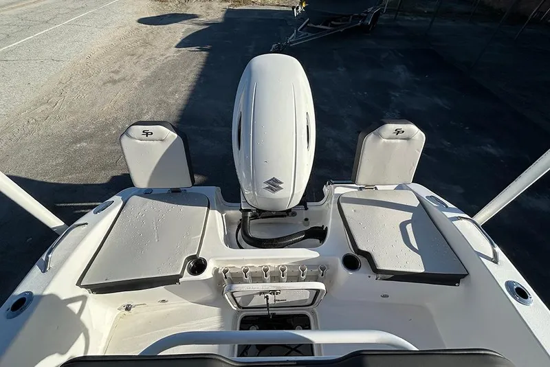 Slide: The Image of 2026 Sea Pro 202 Center Console boat with outboard motor, rear view. - 17