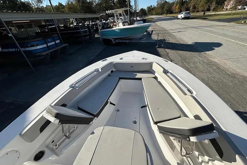 Slide: The Image of 2026 Sea Pro 202 Center Console boat with spacious seating and sleek design. - 27