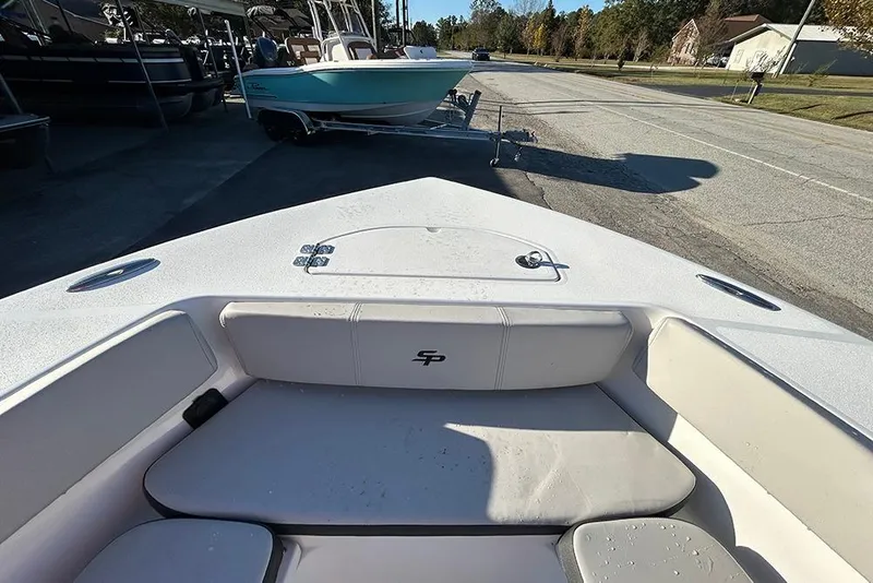 Slide: The Image of 2026 Sea Pro 202 Center Console boat interior with seating and storage. - 29