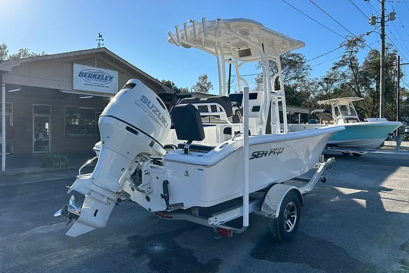 Slide: The Image of 2026 Sea Pro 202 Center Console boat with Suzuki outboard motor at dealership. - 4