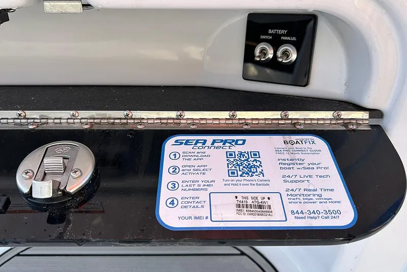 Slide: The Image of 2026 Sea Pro 202 Center Console dashboard with battery switch and registration instructions. - 44