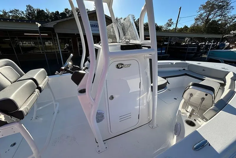 Slide: The Image of 2026 Sea Pro 202 Center Console boat interior with seating and steering console. - 45