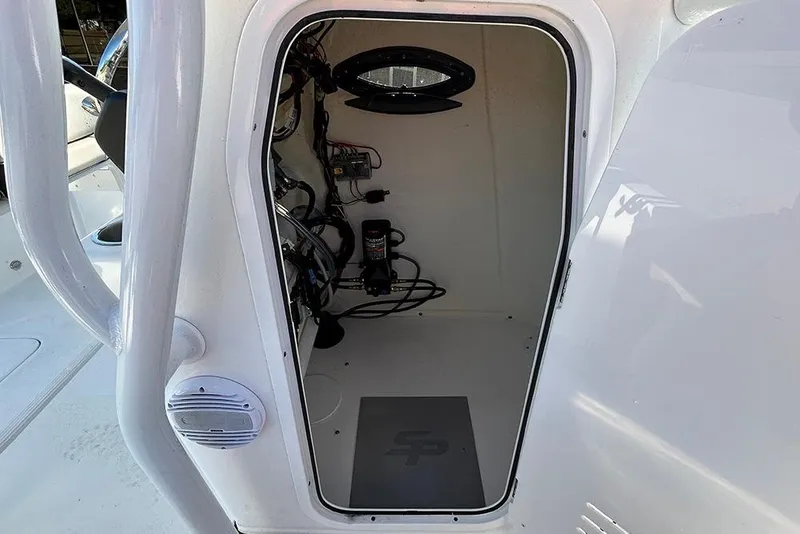 Slide: The Image of 2026 Sea Pro 202 Center Console interior view with wiring and equipment. - 46