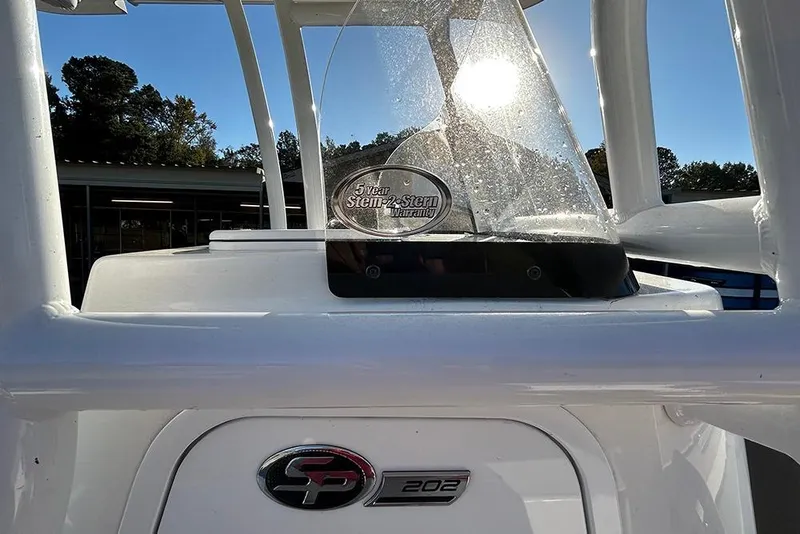 Slide: The Image of 2026 Sea Pro 202 Center Console boat with warranty badge, sunlit background. - 48