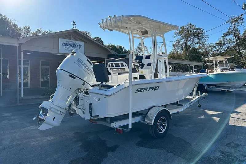 Slide: The Image of 2026 Sea Pro 202 Center Console boat with Suzuki engine on trailer at dealership. - 6