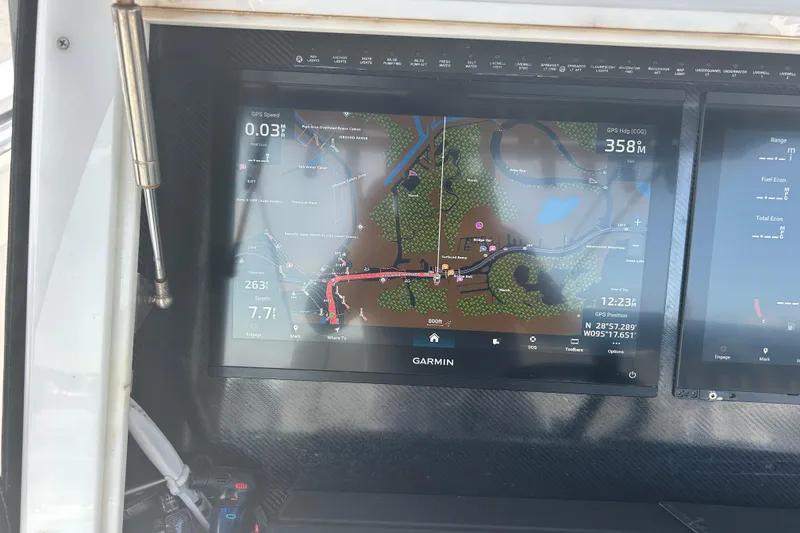 Slide: The Image of Garmin navigation display on 2016 SeaHunter 39 Tournament boat, showing GPS and map details. - 20