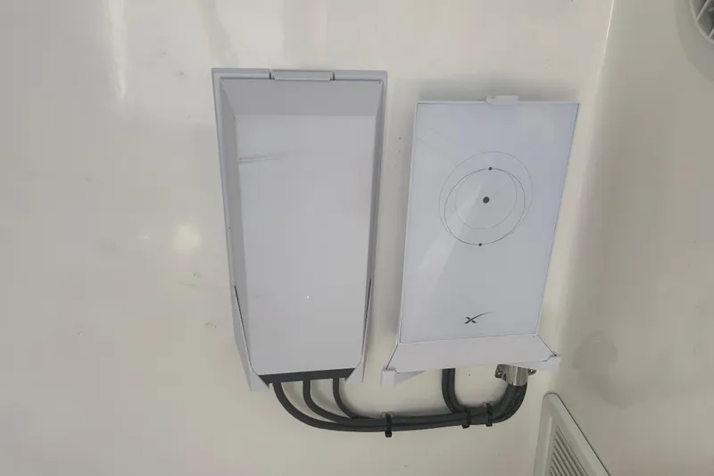 Slide: The Image of Satellite communication equipment on a 2016 SeaHunter 39 Tournament boat. - 23