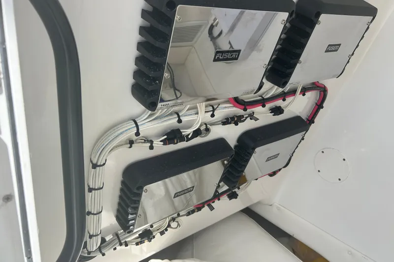 Slide: The Image of Electrical system of 2016 SeaHunter 39 Tournament boat with Fusion amplifiers and wiring. - 24