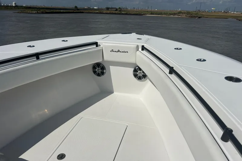 Slide: The Image of 2016 SeaHunter 39 Tournament boat interior with sleek white design and speaker system. - 28