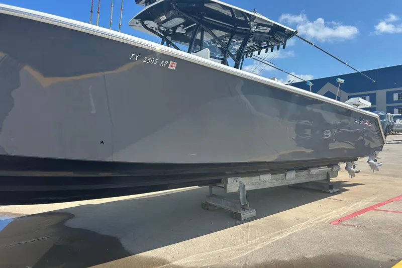 Slide: The Image of 2016 SeaHunter 39 Tournament boat on a stand, side view, sunny day. - 3