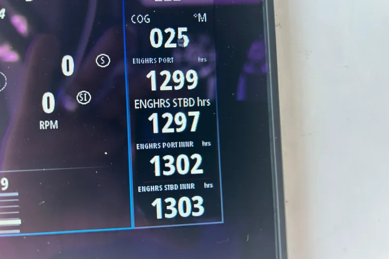 Slide: The Image of Display screen showing engine hours and RPM on 2016 SeaHunter 39 Tournament. - 40