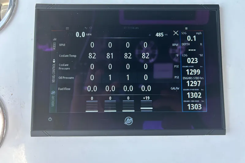 Slide: The Image of Digital display panel on a 2016 SeaHunter 39 Tournament boat showing engine metrics. - 41