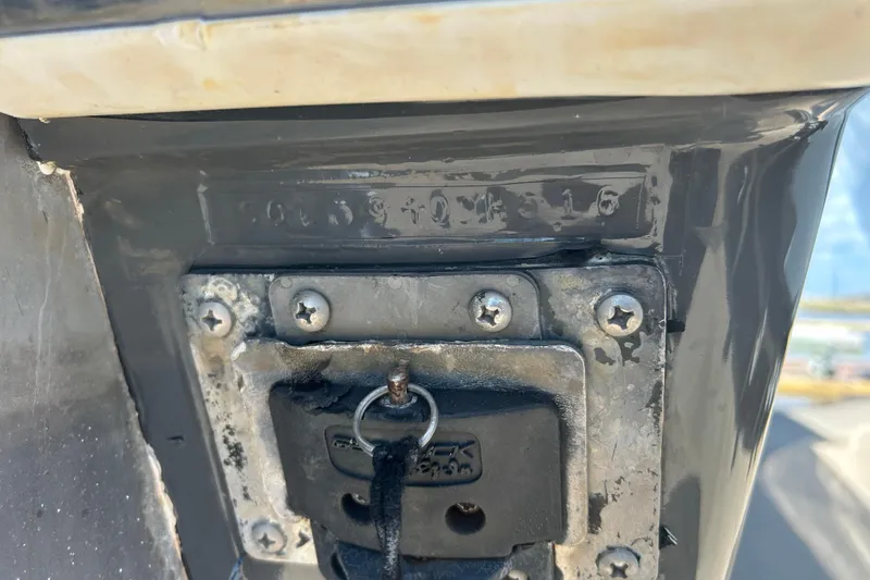 Slide: The Image of Close-up of a 2016 SeaHunter 39 Tournament boat's identification plate and hardware. - 49