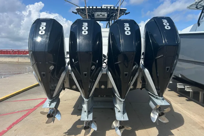 Slide: The Image of Four Mercury 300 outboard engines on a 2016 SeaHunter 39 Tournament boat. - 7