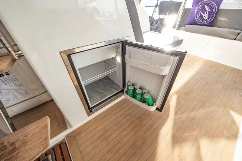 Slide: The Image of Spacious interior of 2023 Fountaine Pajot Tanna 47 catamaran with modern seating and dining area. - 17