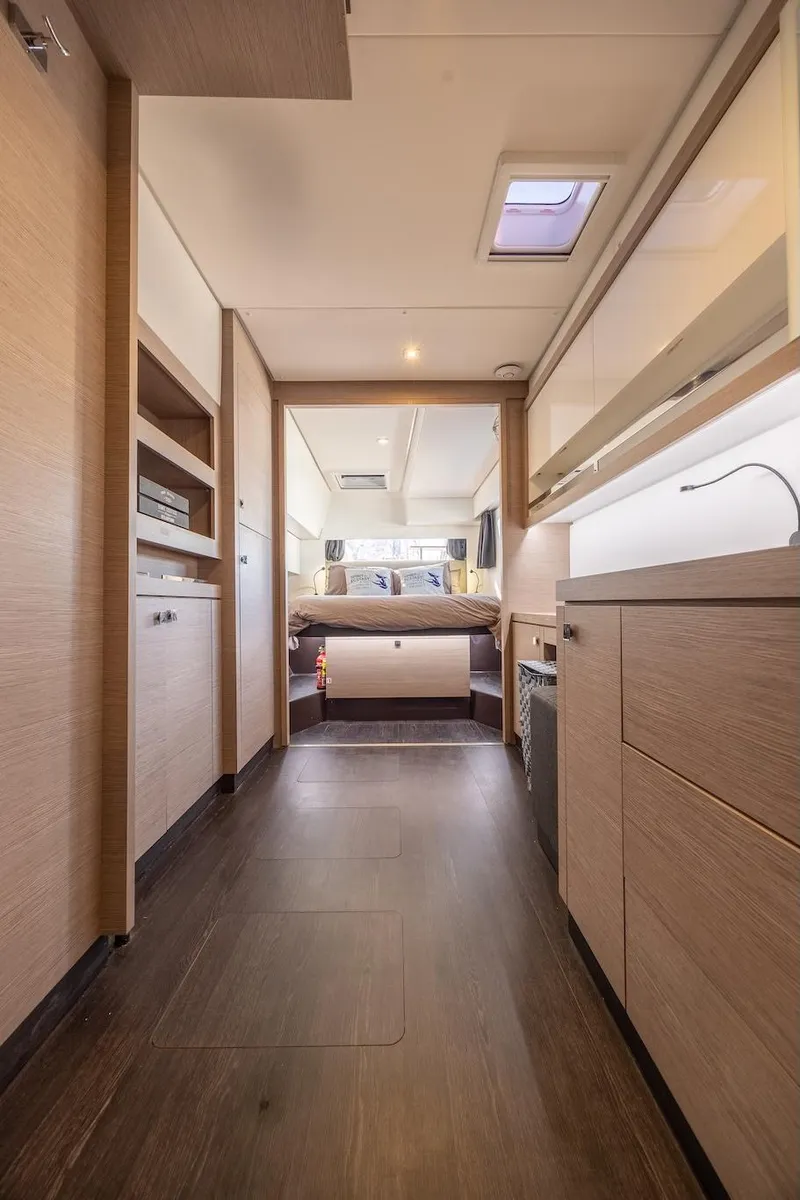 Slide: The Image of Interior of 2023 Fountaine Pajot Tanna 47 yacht, featuring modern design and spacious cabin. - 36