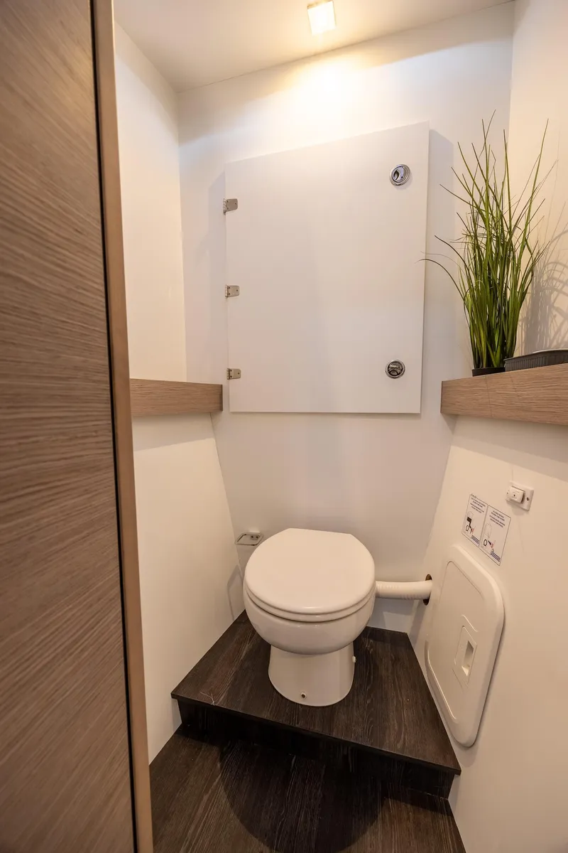 Slide: The Image of Luxurious bathroom in 2023 Fountaine Pajot Tanna 47 yacht with modern fixtures and spacious design. - 48