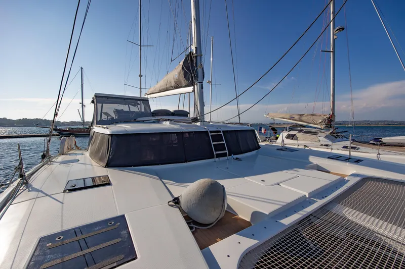 Slide: The Image of Interior of 2023 Fountaine Pajot Tanna 47 catamaran with spacious seating and modern design. - 5