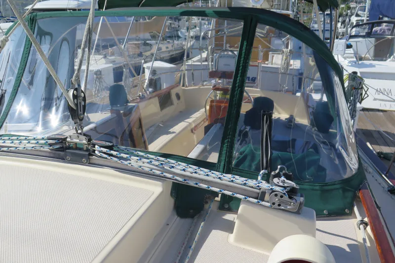 Slide: The Image of Garmin navigation device on 1990 Island Packet 35 yacht dashboard. - 19