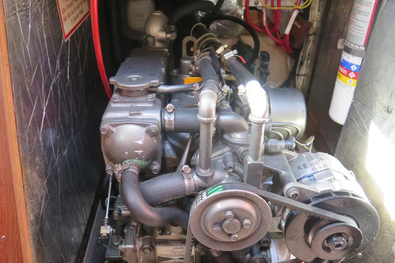 Slide: The Image of Cockpit of 1990 Island Packet 35 sailboat with Garmin navigation system and compass. - 23