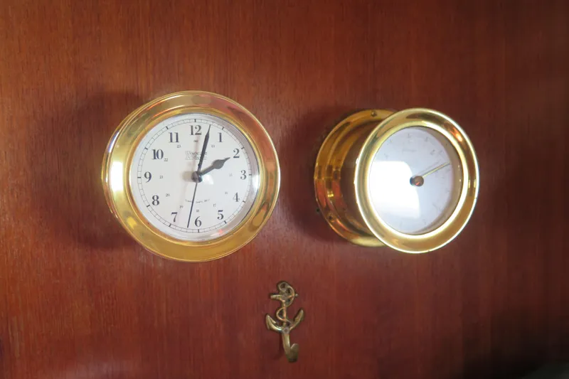 Slide: The Image of Engine compartment of a 1990 Island Packet 35 sailboat, showcasing mechanical components. - 40