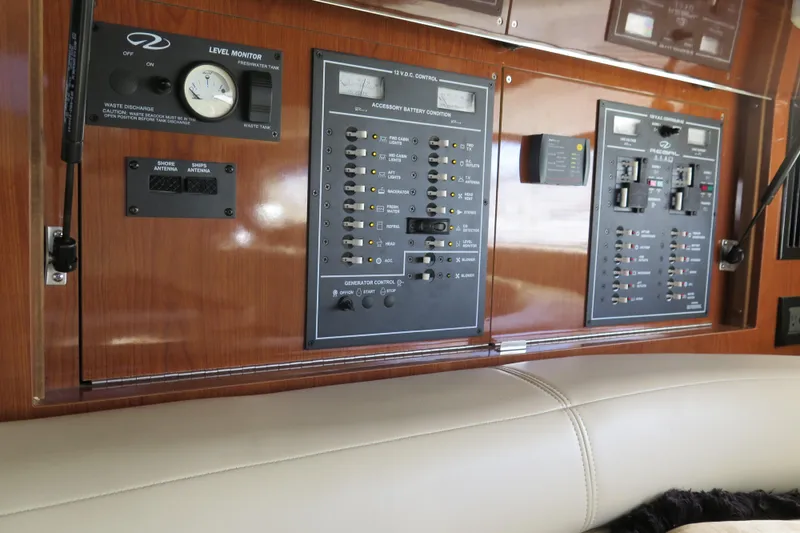 Slide: The Image of 1990 Island Packet 35 yacht bathroom with wooden cabinetry and stainless steel sink. - 51