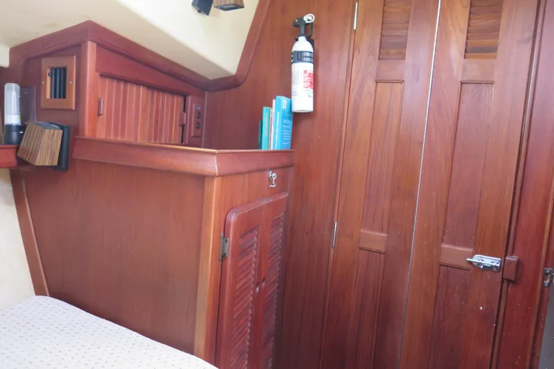 Slide: The Image of 1990 Island Packet 35 sailboat illustration with detailed design and branding. - 53