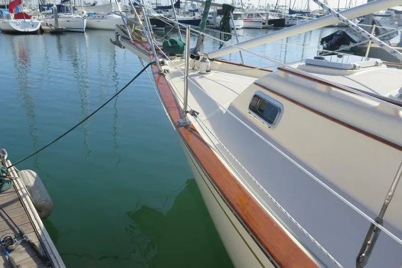 Slide: The Image of 1990 Island Packet 35 sailboat named Avalon docked in San Diego marina. - 7